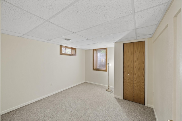 3364 85th Ave, Princeton, MN 55371 - basement with a paneled ceiling, carpet, and baseboards