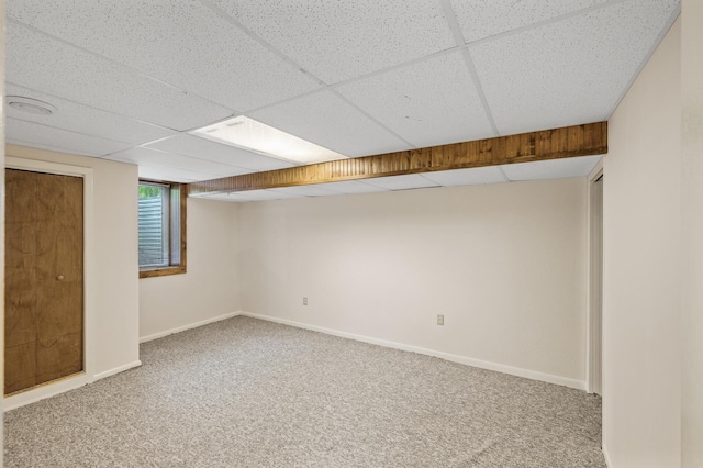 3364 85th Ave, Princeton, MN 55371 - below grade area with carpet, a drop ceiling, and baseboards