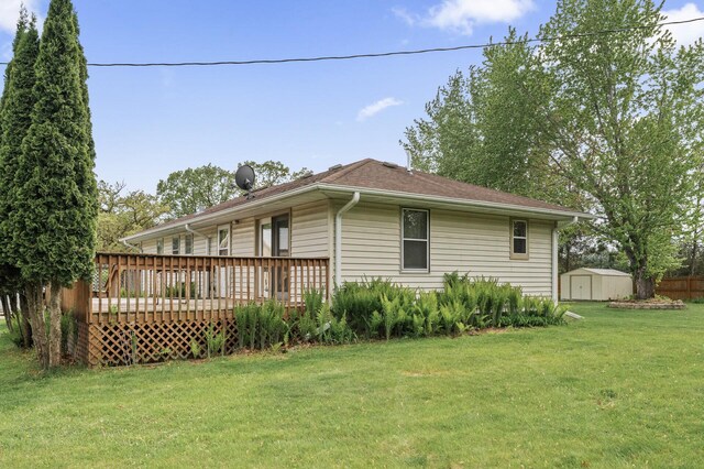 3364 85th Ave, Princeton, MN 55371 - view of home's exterior featuring a wooden deck and a lawn