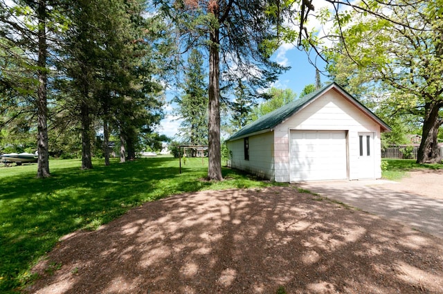 915 Knapp St, Rice Lake, WI 54868 - detached garage featuring asphalt driveway