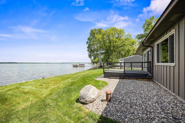 67854 217th St, Darwin, MN 55324 - view of green lawn featuring a deck with water view
