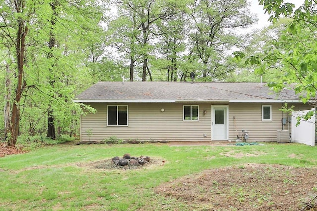 18917 Hartley Lake Rd, Brainerd, MN 56401 - back of house featuring an outdoor fire pit and a yard