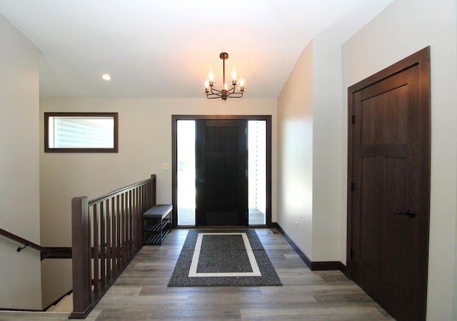 1707 17th St NW, Willmar, MN 56201 - entryway with a chandelier, healthy amount of natural light, light wood-style flooring, baseboards, and recessed lighting
