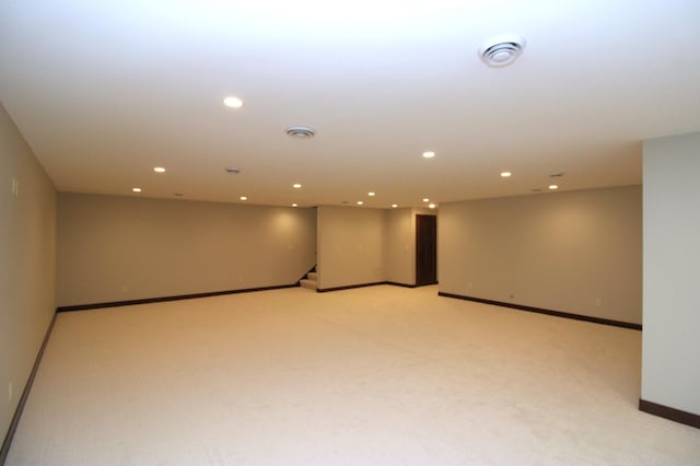 1707 17th St NW, Willmar, MN 56201 - unfurnished room featuring recessed lighting, light carpet, baseboards, and stairway