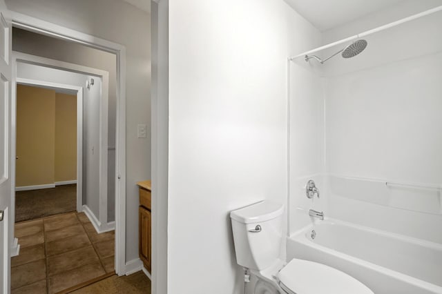 3545 Minnehaha Ave, Minneapolis, MN 55406 - full bathroom featuring toilet, shower / bath combination, vanity, baseboards, and tile patterned flooring