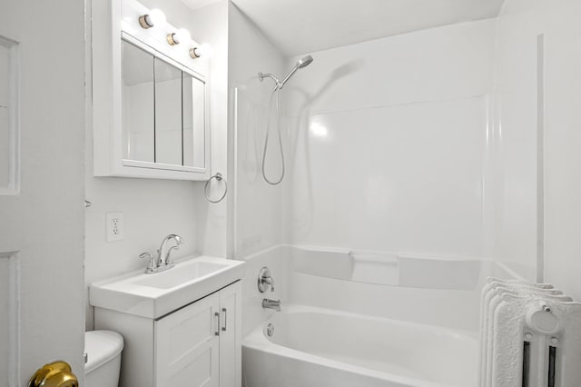 3545 Minnehaha Ave, Minneapolis, MN 55406 - bathroom featuring toilet, vanity, and shower / bath combination