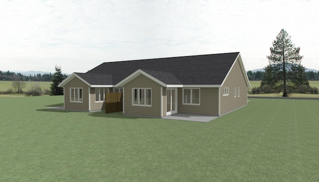 622 Sundance St, Amery, WI 54001 - view of front of home with a front yard, roof with shingles, and a patio area