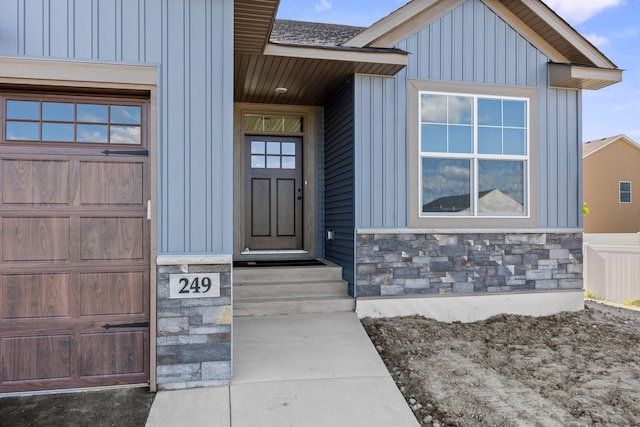 249 3rd St SW, Delano, MN 55328 - view of exterior entry featuring stone siding