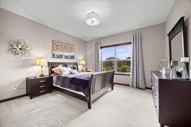 249 3rd St SW, Delano, MN 55328 - bedroom with baseboards and light carpet