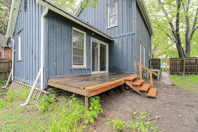 1066 Reaney Ave, Saint Paul, MN 55106 - back of house with board and batten siding and a wooden deck