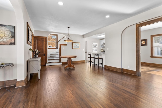 781 7th St, Red Wing, MN 55066 - interior space with wood finished floors, stairway, recessed lighting, arched walkways, and baseboards