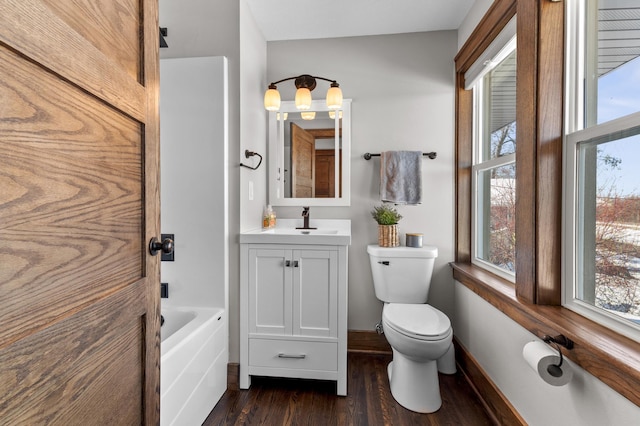 781 7th St, Red Wing, MN 55066 - bathroom with toilet, wood finished floors, vanity, and baseboards