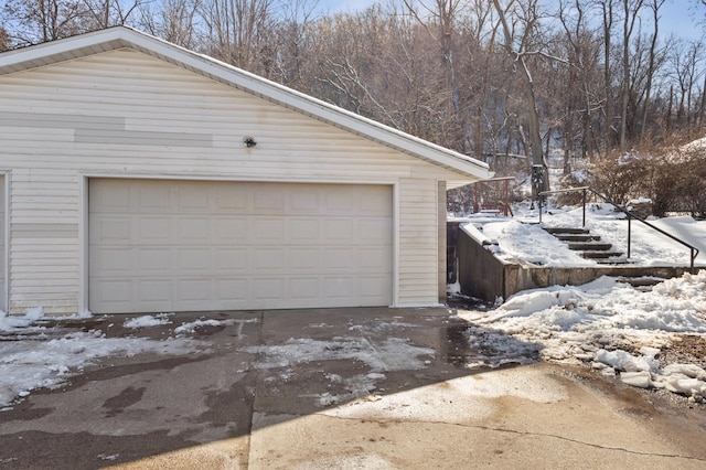 781 7th St, Red Wing, MN 55066 - snow covered garage with a detached garage