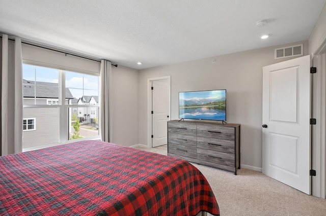 7602 Connie Ln, Inver Grove Heights, MN 55076 - bedroom with light colored carpet, baseboards, and recessed lighting