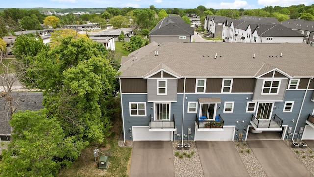 7602 Connie Ln, Inver Grove Heights, MN 55076 - back of property with a residential view and roof with shingles