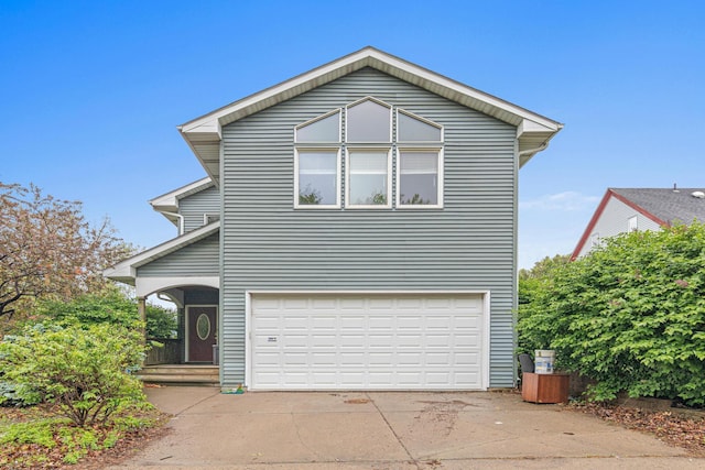 338 Aurora Ave, Saint Paul, MN 55103 - view of front of home with driveway and a garage