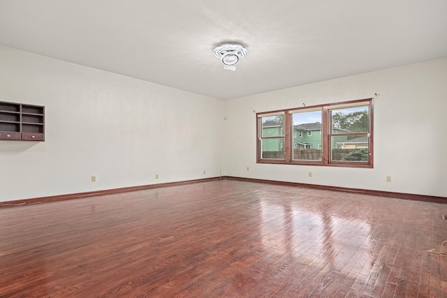 338 Aurora Ave, Saint Paul, MN 55103 - empty room with wood finished floors and baseboards