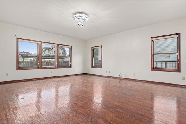338 Aurora Ave, Saint Paul, MN 55103 - spare room with hardwood / wood-style flooring and baseboards