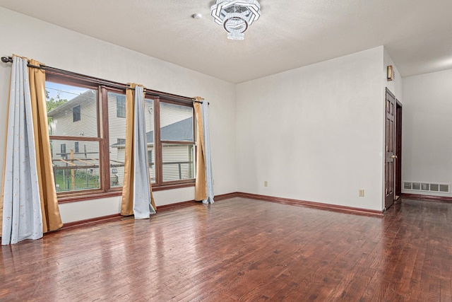 338 Aurora Ave, Saint Paul, MN 55103 - unfurnished room with wood finished floors and baseboards