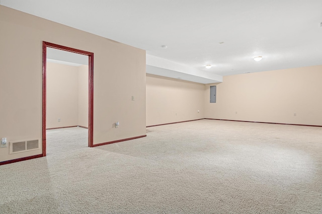 338 Aurora Ave, Saint Paul, MN 55103 - unfurnished room with electric panel, baseboards, and carpet floors