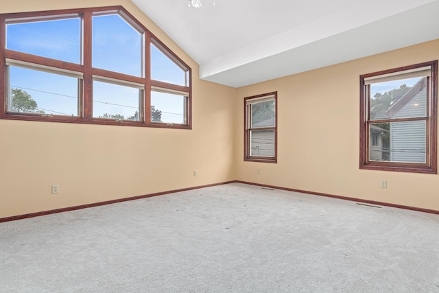 338 Aurora Ave, Saint Paul, MN 55103 - carpeted empty room featuring vaulted ceiling and baseboards