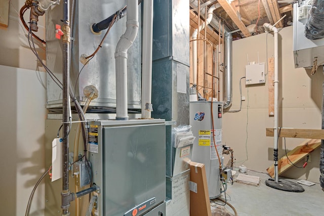 338 Aurora Ave, Saint Paul, MN 55103 - utility room with water heater and heating unit