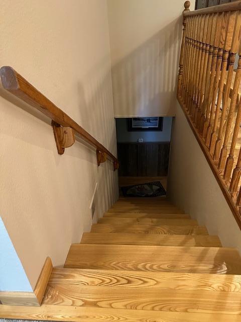 26722 Eisenmen Dr, Leonard, MN 56652 - stairs with wood finished floors