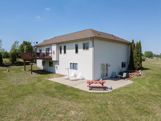 9368 188th Ave NW, Nowthen, MN 55330 - back of house featuring a yard, a patio, and a deck