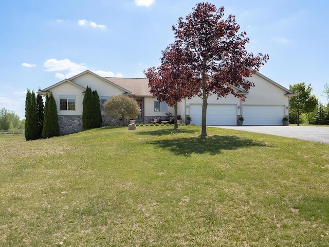 9368 188th Ave NW, Nowthen, MN 55330 - view of front facade featuring stone siding, a front lawn, concrete driveway, and a garage