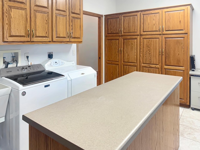 16 Pheasant Dr, Mason Twp, MN 56172 - laundry area with cabinet space, independent washer and dryer, and light tile patterned floors