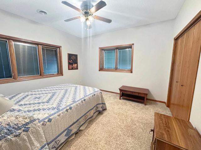 16 Pheasant Dr, Mason Twp, MN 56172 - bedroom featuring a closet, carpet floors, baseboards, and ceiling fan