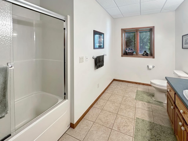 16 Pheasant Dr, Mason Twp, MN 56172 - bathroom with vanity, baseboards, a drop ceiling, tile patterned flooring, and toilet