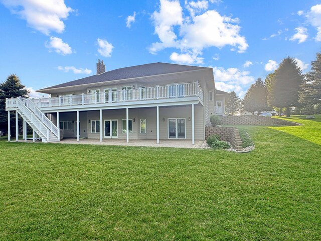 16 Pheasant Dr, Mason Twp, MN 56172 - rear view of property with a patio area, a lawn, a chimney, stairs, and a wooden deck