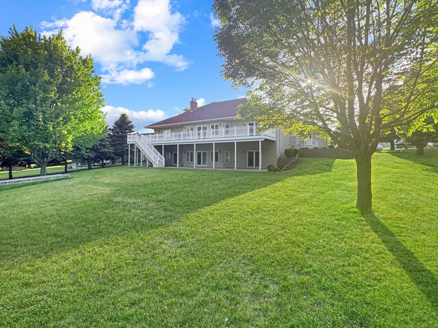 16 Pheasant Dr, Mason Twp, MN 56172 - back of house with a deck, stairway, a yard, and a chimney