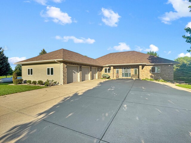 16 Pheasant Dr, Mason Twp, MN 56172 - ranch-style home featuring a garage, concrete driveway, brick siding, and roof with shingles