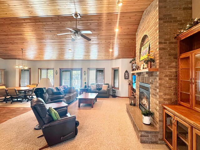 16 Pheasant Dr, Mason Twp, MN 56172 - living room featuring wooden ceiling, a brick fireplace, ceiling fan, carpet flooring, and a chandelier