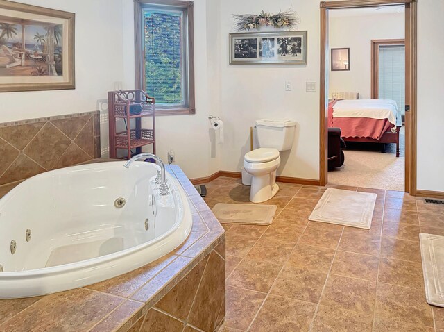 16 Pheasant Dr, Mason Twp, MN 56172 - full bathroom featuring a whirlpool tub, toilet, connected bathroom, and baseboards