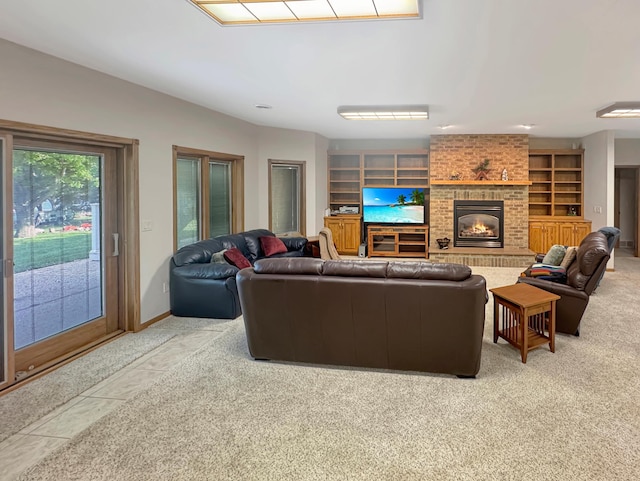 16 Pheasant Dr, Mason Twp, MN 56172 - living area with a fireplace, built in shelves, baseboards, and light colored carpet
