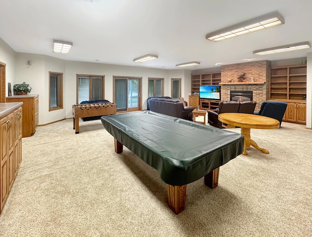 16 Pheasant Dr, Mason Twp, MN 56172 - game room with light colored carpet, pool table, a fireplace, and baseboards