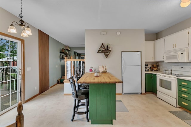 215 Main St E, Freeport, MN 56331 - kitchen featuring white appliances, wood counters, white cabinetry, a chandelier, and decorative backsplash