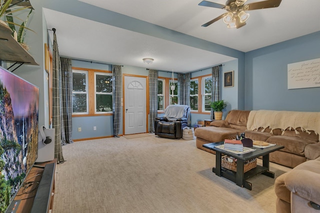 215 Main St E, Freeport, MN 56331 - carpeted living room with a ceiling fan and baseboards