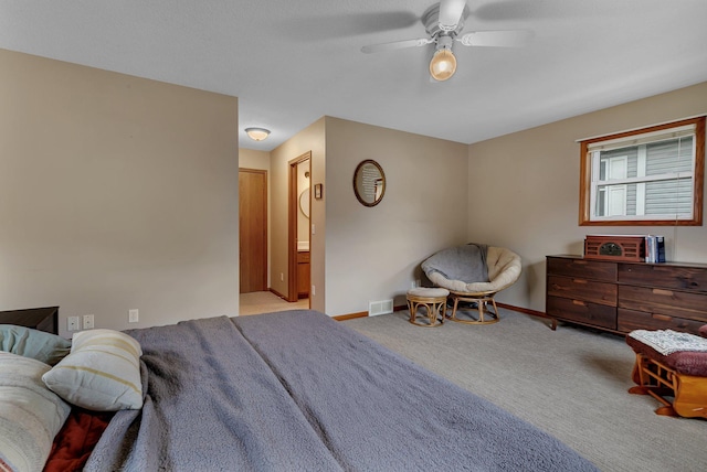 215 Main St E, Freeport, MN 56331 - carpeted bedroom with baseboards and a ceiling fan
