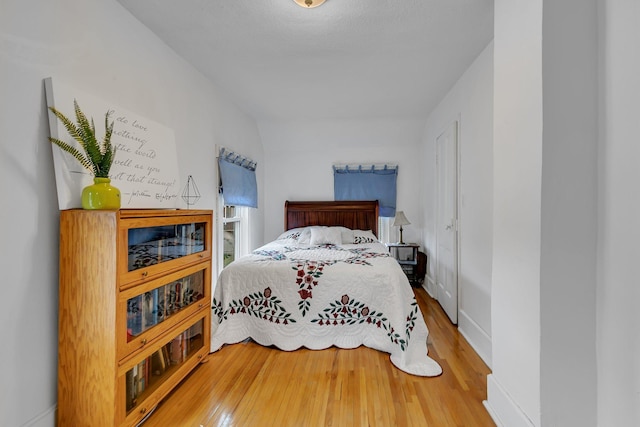 215 Main St E, Freeport, MN 56331 - bedroom featuring wood finished floors and baseboards