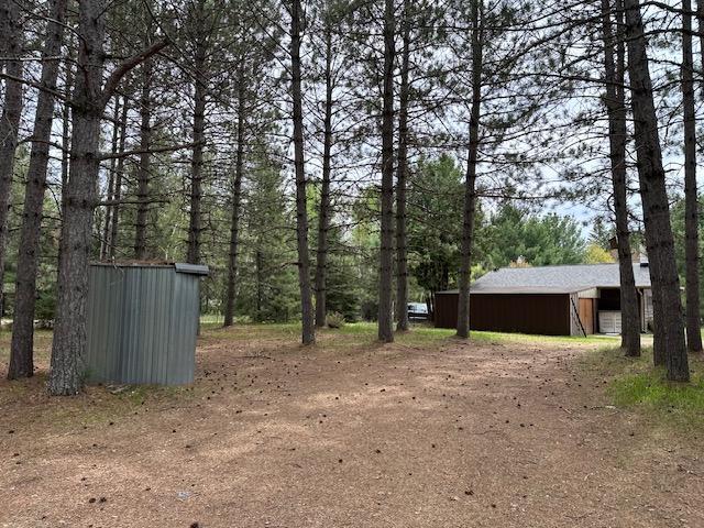 6563 Sandy Ln, Biwabik Twp, MN 55741 - view of yard with an outbuilding and driveway
