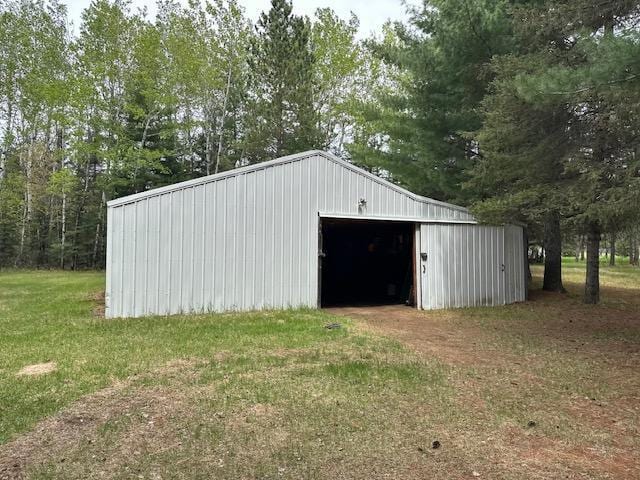 6563 Sandy Ln, Biwabik Twp, MN 55741 - view of pole building with a lawn