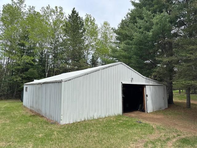 6563 Sandy Ln, Biwabik Twp, MN 55741 - view of pole building with a yard