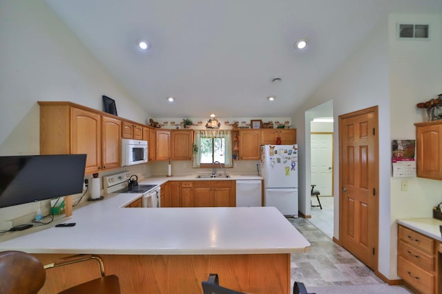 909 Lilac Ln, Little Falls, MN 56345 - kitchen featuring white appliances, lofted ceiling, a sink, light countertops, and recessed lighting
