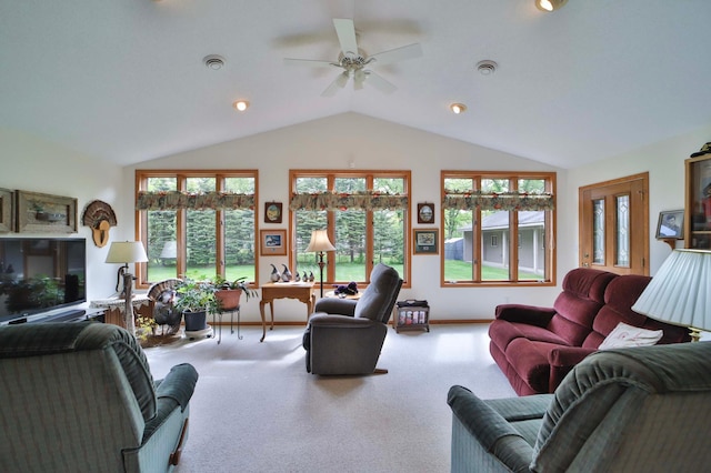 909 Lilac Ln, Little Falls, MN 56345 - living area featuring carpet floors, vaulted ceiling, healthy amount of natural light, and a ceiling fan