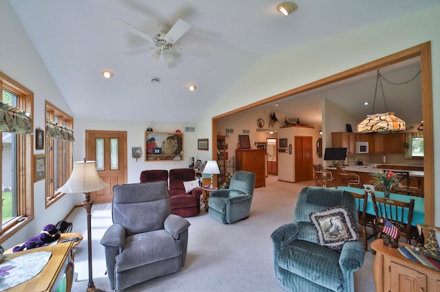 909 Lilac Ln, Little Falls, MN 56345 - living area featuring lofted ceiling, light colored carpet, a ceiling fan, and recessed lighting
