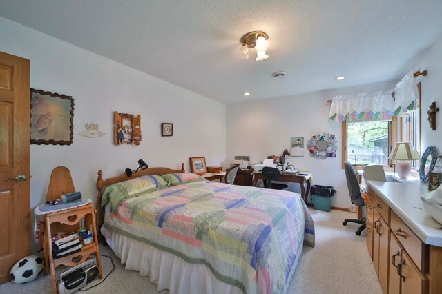 909 Lilac Ln, Little Falls, MN 56345 - bedroom with light colored carpet, an office area, recessed lighting, and baseboards